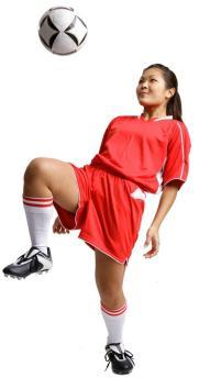 girl playing soccer
