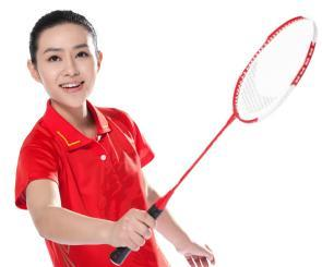 woman holding a badminton racket